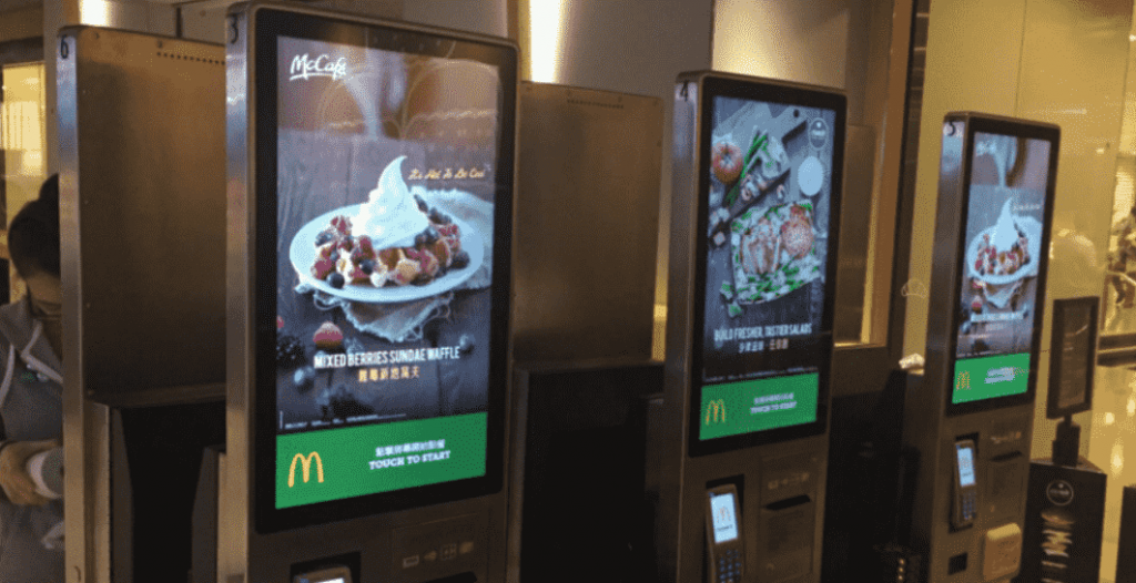 Shortage of fast food workers is speeding automation, higher wages and